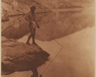 239
After Edward S. Curtis
(1868-1952)
"Shores of Walker Lake," plate 534 from "The North American Indian," 1924
Photogravure in brown on paper
From the Suffolk Engraving Co., Cambridge, MA edition printed after the 1924 original photograph copyrighted by Curtis; with the title, plate number, copyright, publisher, and artist name all printed in the blank outside the image
Image: 15.25" H x 11.5" W; Sight: 16.5" H x 12.75" W
Estimate: $300 - $500