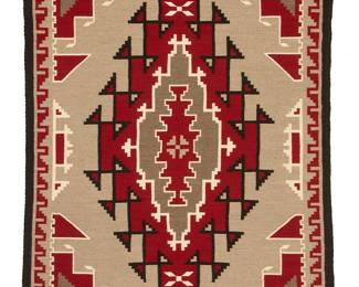 70
A Lucille Silver Navajo Ganado rug
Lucille Silver (b. 20th century, Diné)
Late 20th century
Woven in red, light and dark grey, cream, and black wool with an elaborate central diamond motif and stepped corners, wtih an elaborate stepped border
58.5" H x 40.5" W
Estimate: $300 - $500