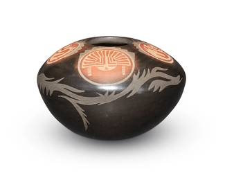 52
Grace Medicine Flower (b. 1938, Santa Clara Pueblo) & Camilio "Sunflower" Tafoya (1902-1995, Santa Clara Pueblo)
A polychrome sgraffito blackware and redware jar, late 20th century
With etched signatures to base: Grace Medicine Flower [flower cipher] / and / Camilio Tafoya
A shaped rounded jar or possibly seed pot with curvilinear etched serpent/wolf motif and redware etched medallions with mask motifs
3" H x 5" Dia.
Estimate: $300 - $500
