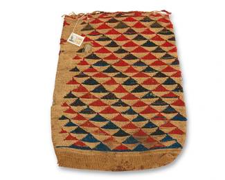 56
A Nez Perce twined corn husk bag
Late 19th/early 20th century, Nimiipuu; Northwest Plateau
The double-sided flat twined bag with polychrome wool yarn imbricated motifs to each side,
featuring terraced stepped diamonds to one side, and an all-over pattern of conjoined blue and red triangles verso, with woven top edge and twisted cord lacing
22.25" H x 17.5" W
Estimate: $1,000 - $1,500