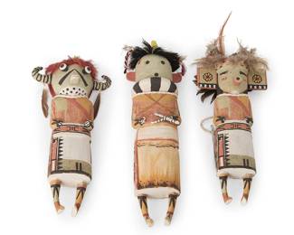 253
Edward Seechoma
(b. 1974, Hopi-Third Mesa)
Three Hopi Pueblo katsinas, early 21st century
Polychrome painted cottonwood, feathers, horsehair
Comprising "Hakto" (Zuni Stick Boy) katsina with black and white striped neck, Muhmá Kwosi (Water Spider Sound) katsina with tableta mask and feathers, and a Buffalo katsina with horned mask, feathers and red hair
3 pieces
Largest: 11.5" H x 4" W x 2.5"D; Smallest: 11" H x 4.5" W x 3" D
Estimate: $700 - $900