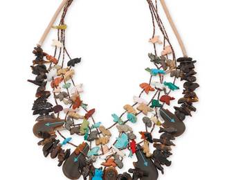 327
A group of Southwest Zuni-style carved animal fetish necklaces
Late 20th century
Three works featuring a triple strand necklace (25.5" L) and a single strand necklace (29" L), each with carved stone animal fetish figures, including bears, wolves, foxes, turtles, birds, fish, and bison, and in various stones such as turquoise, mother of pearl, malachite, and amber, with fine heishi shell spacers and silver cone clasps, as well as a chunky necklace with stacked carved horn animal fetish figures including heartline bears and armadillos, with a central Zuni Tawa sunface dancer figure and a traditional wrapped neck cord (30" L)
3 pieces
165.6 grams gross
Estimate: $300 - $500