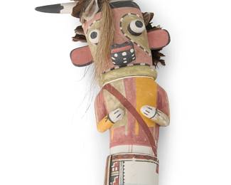 193
Clark Tenakhongva
(b. 1957, Hopi-Third Mesa-Hoat'Ve'La)
A Hopi Pueblo Third Mesa Wakas Cow katsina
Polychrome painted cottonwood, feathers, horsehair
With spotted snout, horns and feathers to mask, and horsehair strand, signed to underside: C.W.T. / !!
16.5" H x 8.75" W x 4" D
Estimate: $300 - $500