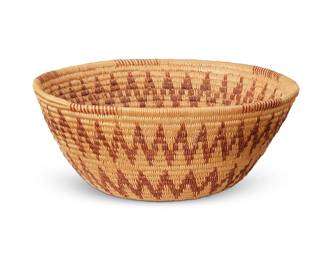 166
A Panamint basketry bowl
Mid-20th century, Timbisha Shoshone; Eastern Central California
The small flared coiled bowl with double zigzag contrast banding and rim ticking
3.25" H x 7.5" Dia.
Estimate: $200 - $400