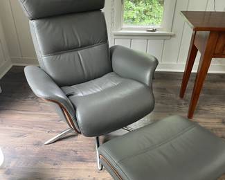 pair of matching IMG (Norway) leather chairs & ottomans