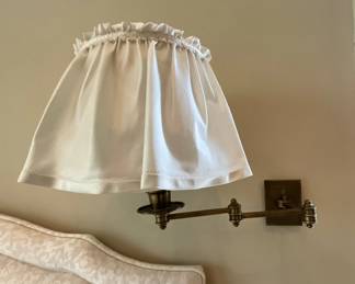 Frilly brass sconces