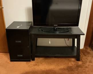 Samsung Tv 30 in , file cabinet (14 1/2x 24 1/2), tv stand (35 1/2x22)