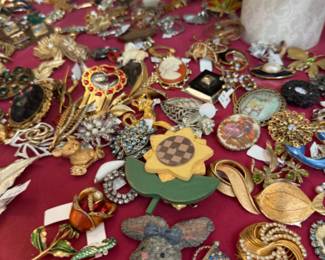 Lots of vintage jewelry and brooches, also check out the jewelry room within our store.