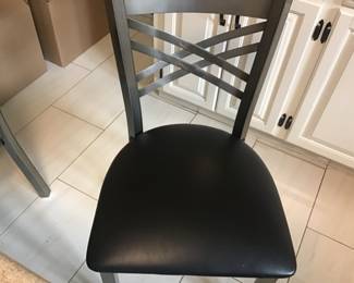 Set of no four metal industrial style chairs