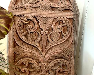 Carved wood wall hanging