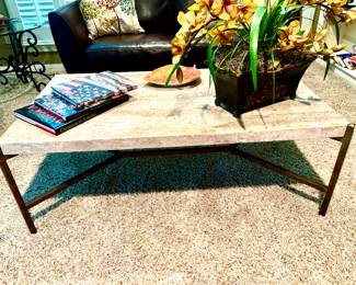 Sleek travertine top coffee table