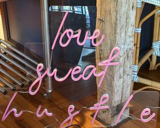 "love sweat" hustle illuminated sign