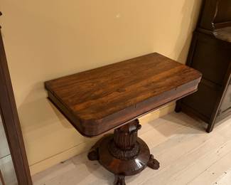 Antique claw foot card table