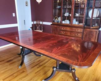 Henkel Harris model 2276 "Flame", double pedestal dining table  with 2 leaved. Mint condition.  Also shown, Henkel Harris breakfront.
