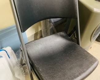 set of four like new folding chairs