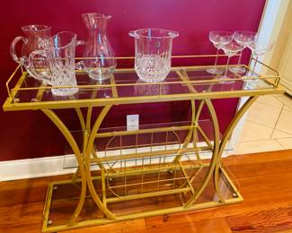 glass and metal bar cart with crystal