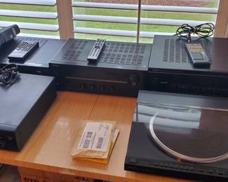 Audio Equipment.  Turn table, amplifiers, speaker.
