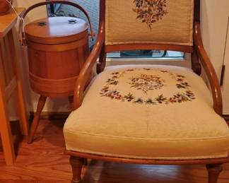 Antique Tapestry chair with casters and an antique sewing stand.
