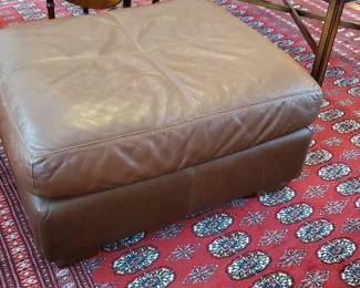 Leather ottoman to go with over stuffed chair. 