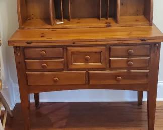 Knotty pine desk with many storage. 