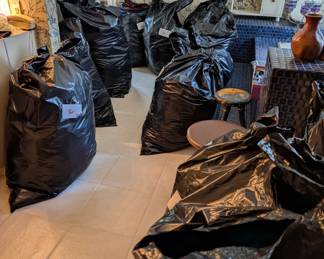 Over 20 bags of clothes to look through. Unfortunately we don't have the space to display better.