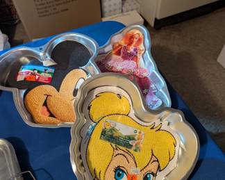 Wilton character cake molds. Several more Wilton cake molds are available - guitar, car, teddy bear, lion