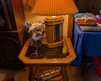 Glass top end tables (there are 2) with lower shelf 
Like New wood base 3 way lamps (there are 2)