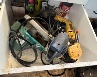 Skill saw, sanders, drill and other tools and shop related items.