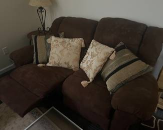 Suede reclining loveseat
