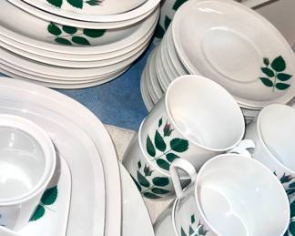 Vintage Dishware -  Arzberg Grand Prix XII porcelain cups, likely part of a larger coffee or tea service. 
This specific pattern features a distinctive wild rose or rose leaves motif in green on white porcelain. 
The Grand Prix XII line was recognized at the Triennale in Milan in 1960. 
