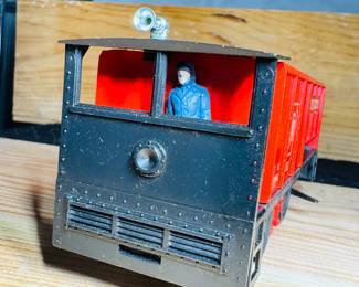 postwar lionel tie jecter car with original hand, painted driver