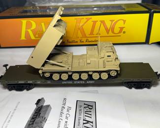 RailKing , US Army flat car with diecast M270 rocket launcher