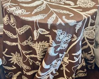 Custom matching embroidered tablecloth and wood table, brown and white