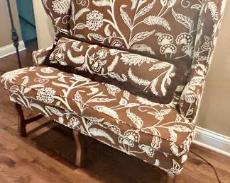 Custom upholstered settee w/ curved wood legs, matching back pillow 48”w x 28dx 45h $795