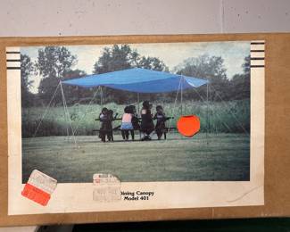Vintage Wall Art – Outdoor Picnic Canopy Scene
Retro framed wall art print featuring a family picnic under a canopy, Model 401 design. Great mid-century style décor for home, cabin, or collector display.