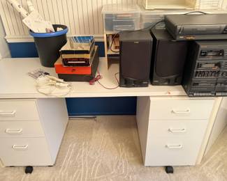 white office desk, storage drawers, home office furniture, vintage stereo system, Sharp cassette deck, retro audio equipment.