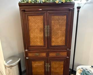 Vintage Asian Style Cabinet w/ Rattan Panels
Beautiful wood storage cabinet featuring woven rattan door panels, brass hardware, and two drawers for extra storage. Perfect as a bar cabinet, media cabinet, or accent furniture piece. Sturdy and stylish with timeless design.