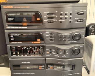 Koss stereo system, vintage audio equipment, cassette deck, CD changer, equalizer, home stereo stack, retro hi-fi system.