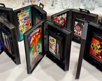 Sega Genesis games, vintage Sega cartridges, complete in box Sega games, retro video game lot, collectible 1990s Sega.
