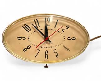 General Electric Model 2H115 Wall Clock, The Contour