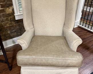 Pair of Wing Back chairs located in entry with a vinyl covered seat (Located in Entry)