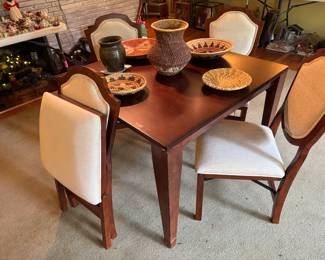Frontgate folding table and four Frontgate folding chairs $600
