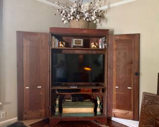 Beautiful rustic corner entertainment center  with lots of space. Also an actual cotton basket with cotton not a replica. 