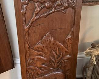 2 carved wooden panels 