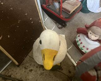 Cement goose with clothes 