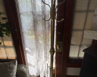 Gold Tone coat/hat rack
71”