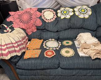 Vintage crocheted doilies, table toppers, runners and even an apron😀