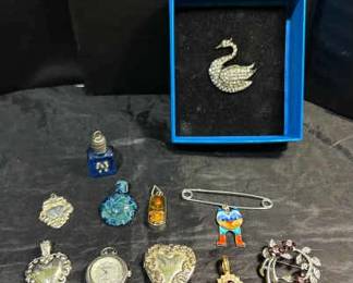 558 Pins, Pendants,  More