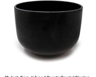 Rare Earth Gallery.   Gem infused Quartz singing bowl. Purchased $1400.     Make offer