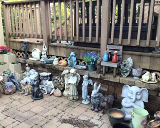 Lots of beautiful concrete yard statues